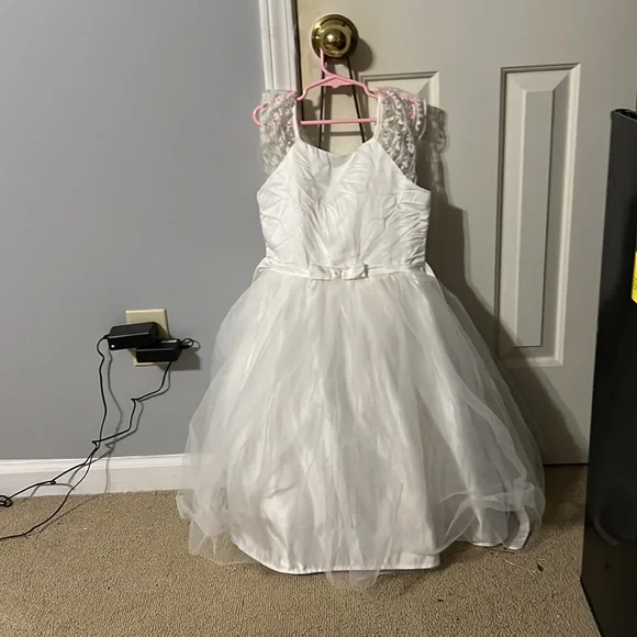 Three formal dresses girls size 10/12. Three formal dresses girls size 10/12.